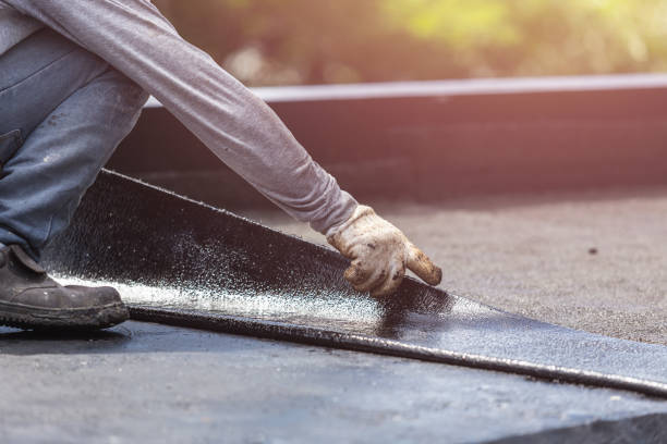 Professional Basement Waterproofing technician working in Flint, MI